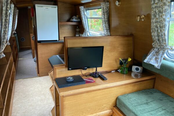 Spacious lounge and kitchen on our electric boat Beaumaris Castle